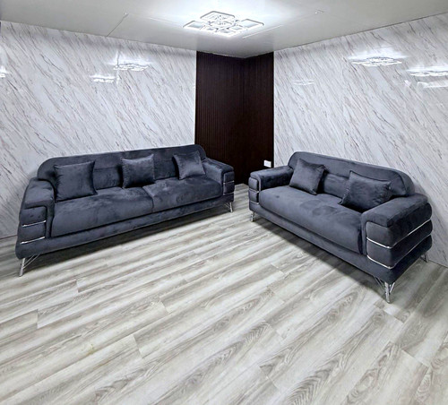 Grey upholstered sofa with - sofa,
